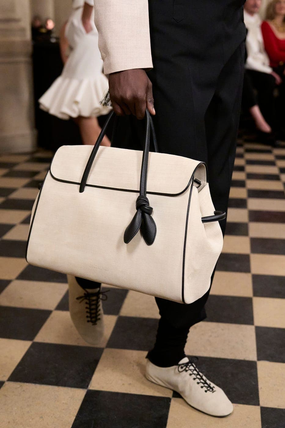 Jacquemus bag on a checkerboard floor